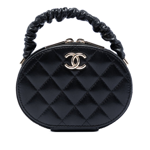 CC Quilted Lambskin Oval Top Handle Clutch - Image 1