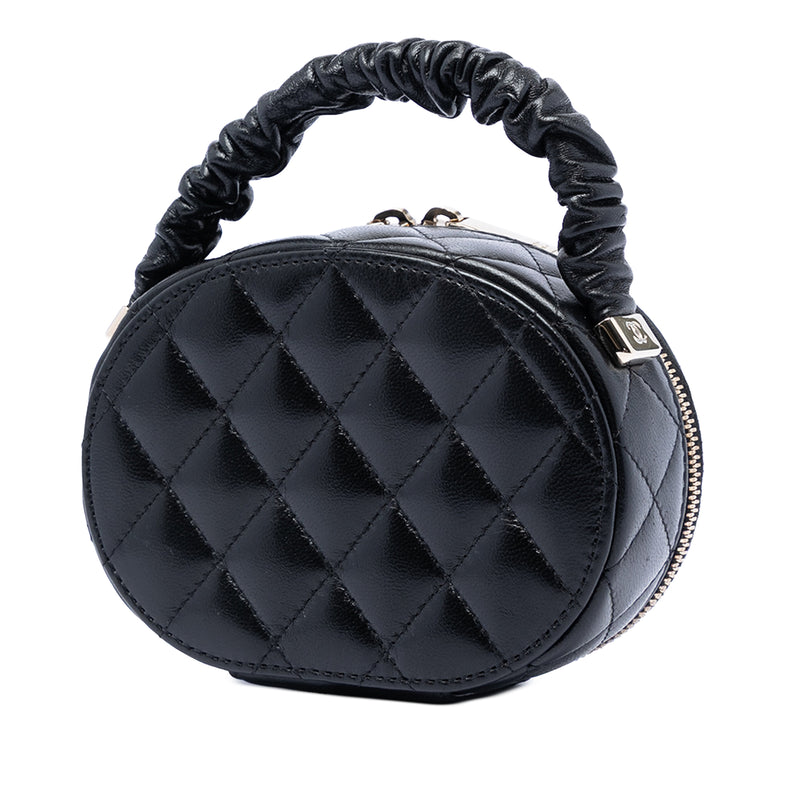 CC Quilted Lambskin Oval Top Handle Clutch - Image 2