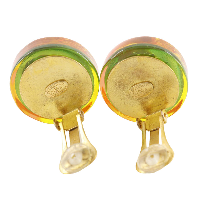 CC Resin Embedded Camellia Shoe Gold Plated Clip On Earrings - Image 3