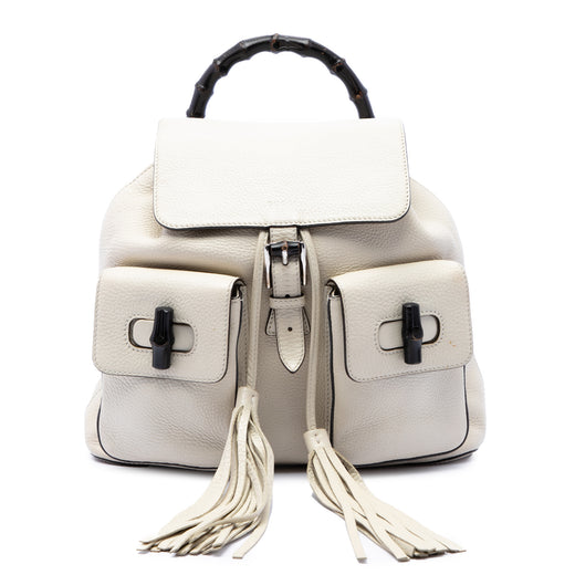 Grained Calfskin Bamboo Tassel Backpack - Image 1