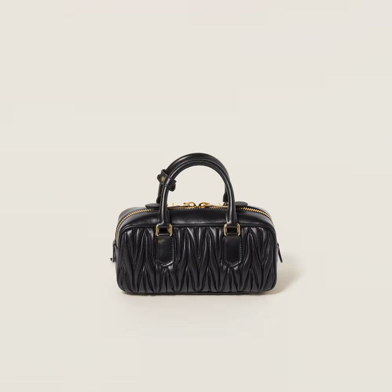 Miu Miu Matelassé Top Handle Bag — Black Leather