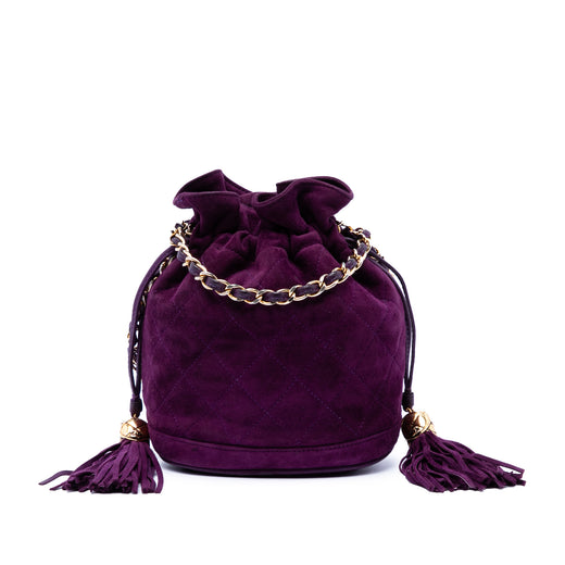 CC Quilted Suede Drawstring Tassel Bucket Bag - Image 1