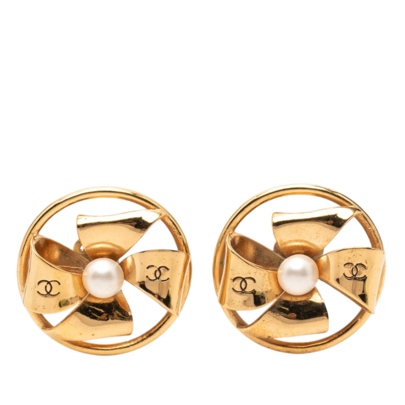 CC Gold Plated Faux Pearl Pinwheel Ribbon Clip On Earrings - Image 1