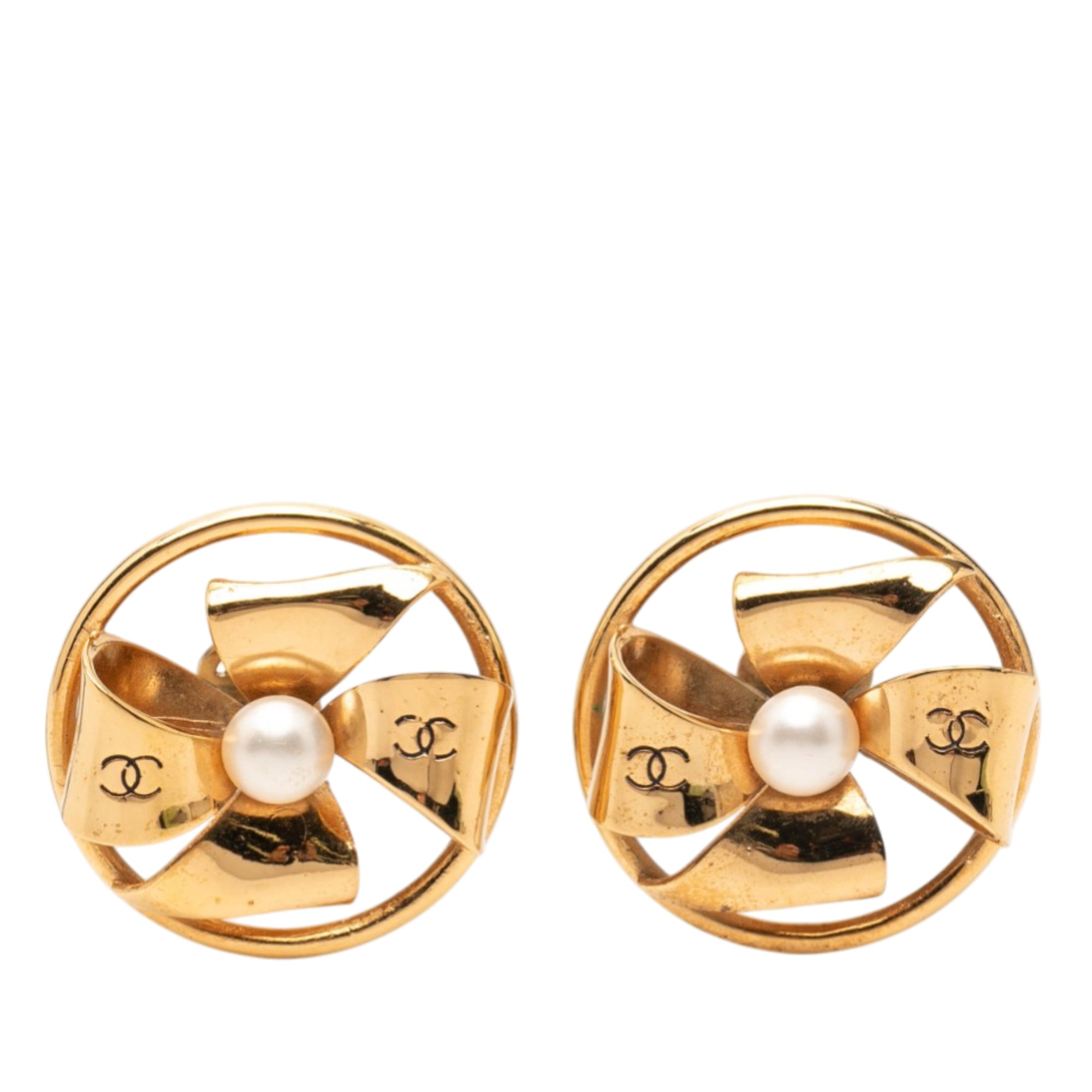 CC Gold Plated Faux Pearl Pinwheel Ribbon Clip On Earrings - Image 1