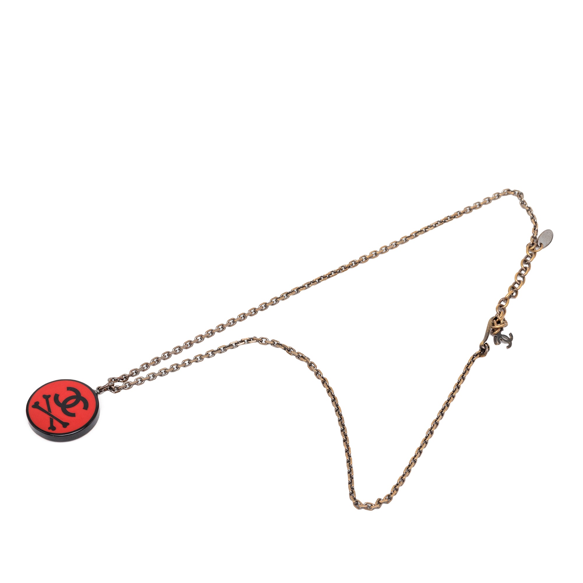 CC Gold Plated Resin Crossbones Round Pendant Necklace - Image 1