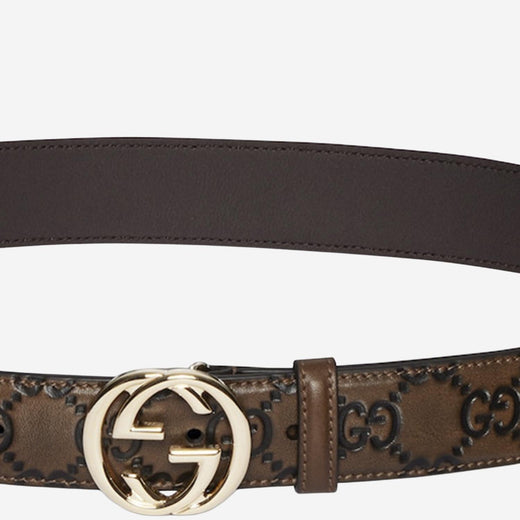 Gucci Gg Logo Embossed Leather Belt — Brown