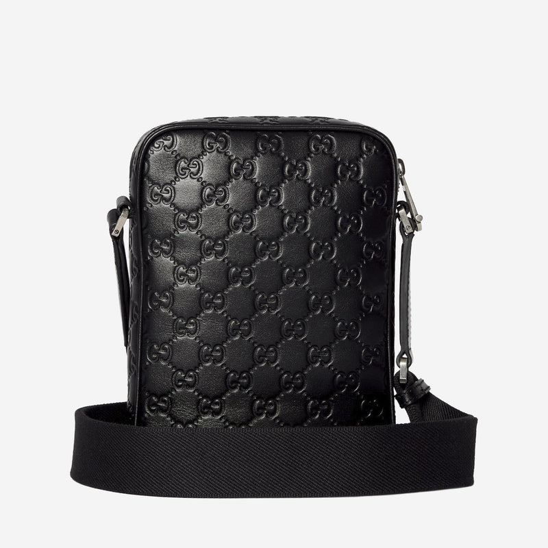 Gucci Gg Embossed Leather Crossbody Bag — Black