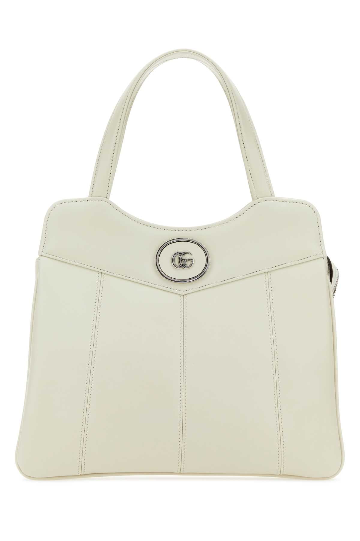 Gucci Leather Gg Medallion Top Handle Bag — Beige