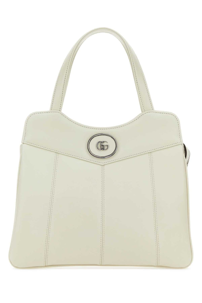 Gucci Leather Gg Medallion Top Handle Bag — Beige
