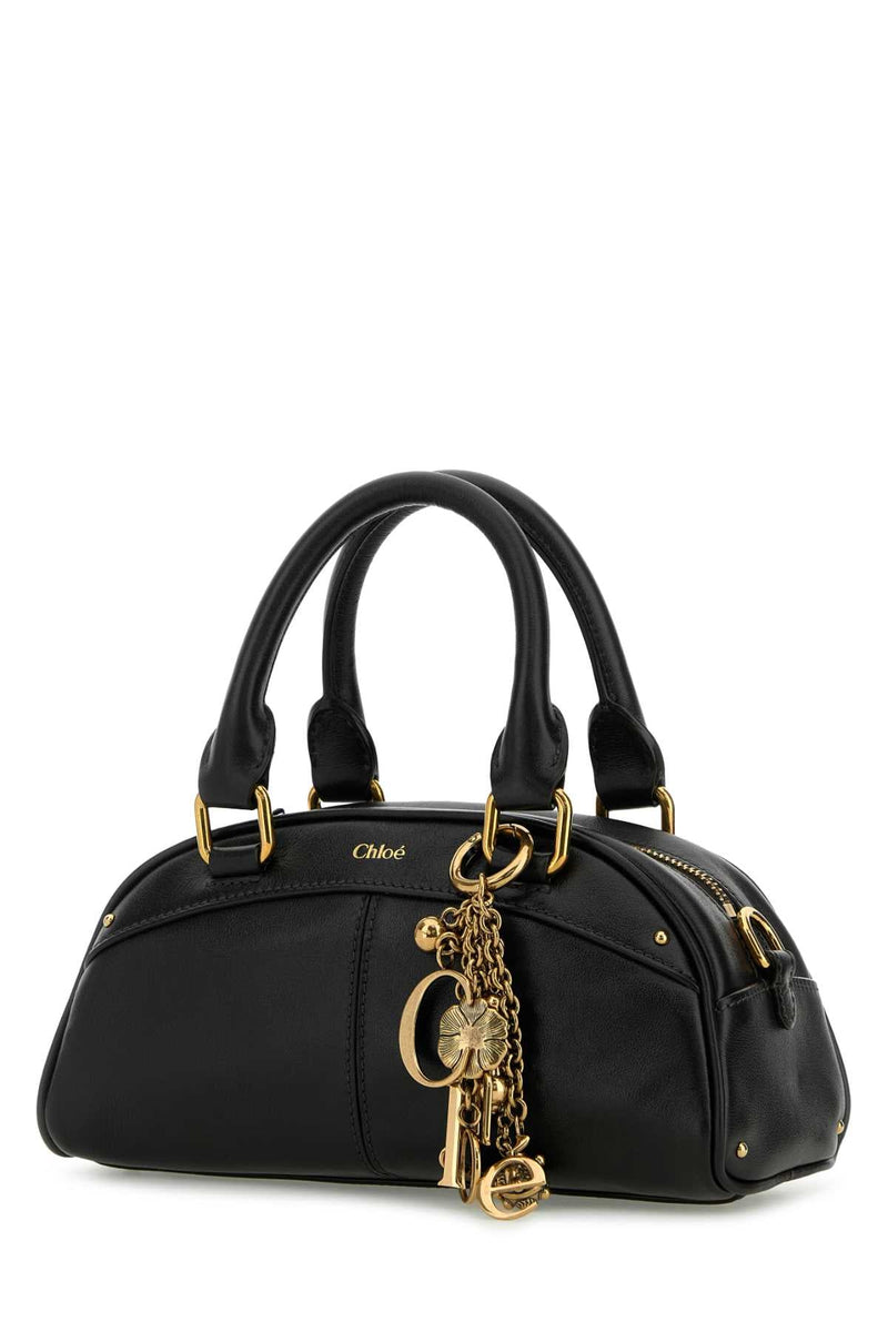 Chloé Calf Leather With Antiqued Gold Charms Top Handle Bag — Black