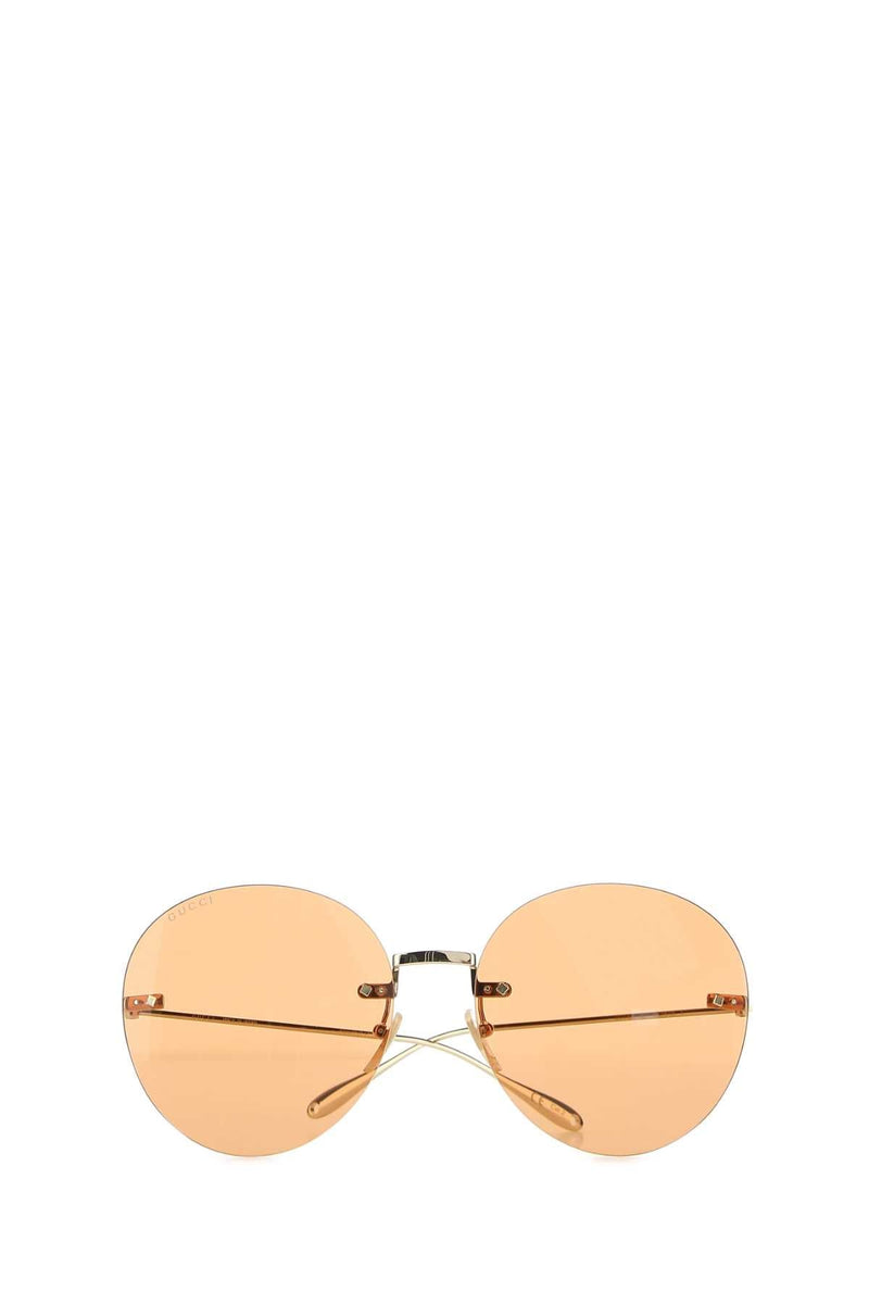 Gucci Gold Metal Round Sunglasses —