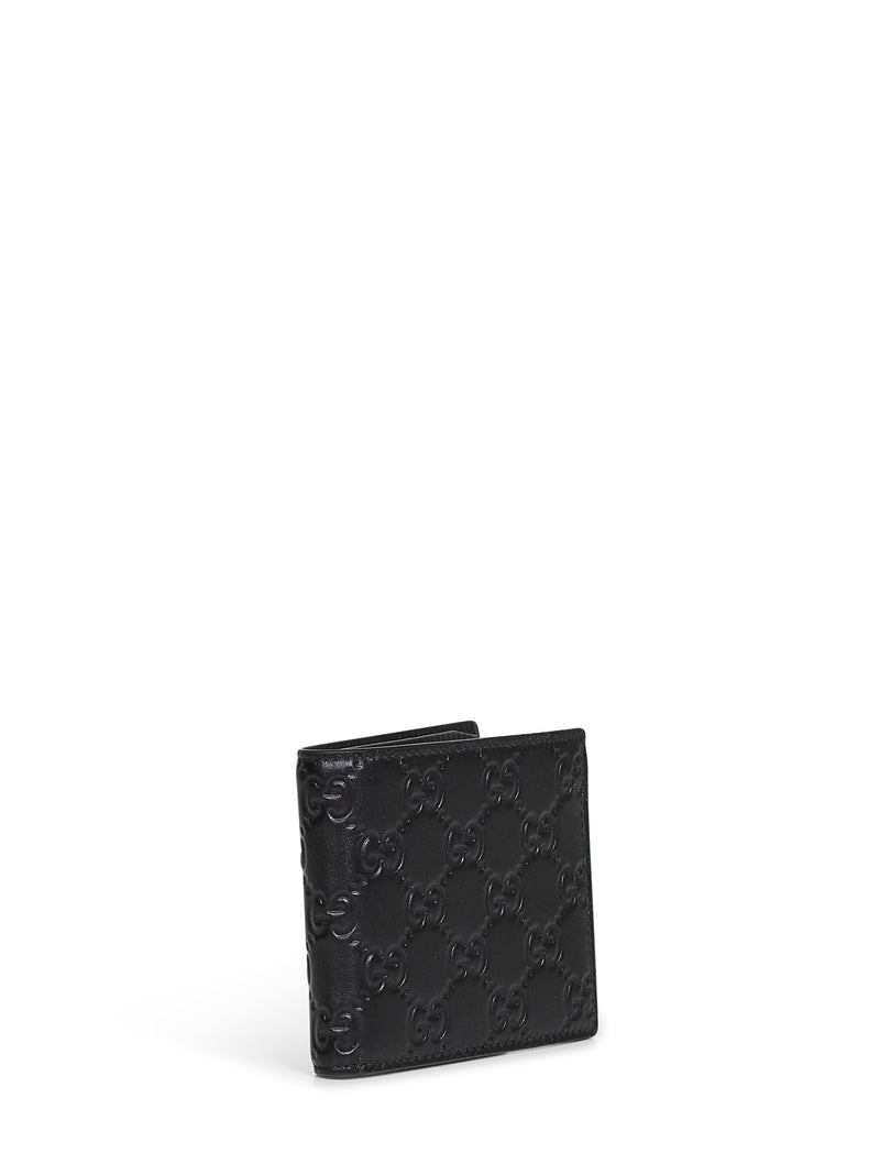 Gucci Embossed Gg Calf Leather Wallet — Black