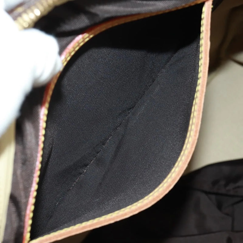 Louis Vuitton Evasion Monogram Canvas Brown Bag