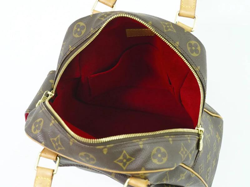 Louis Vuitton Excentri-Cite Monogram Canvas Brown Bag
